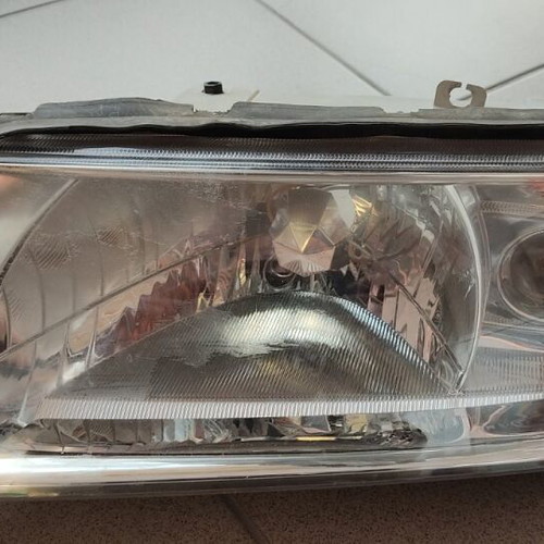 Octavia headlight used, left with broken base
