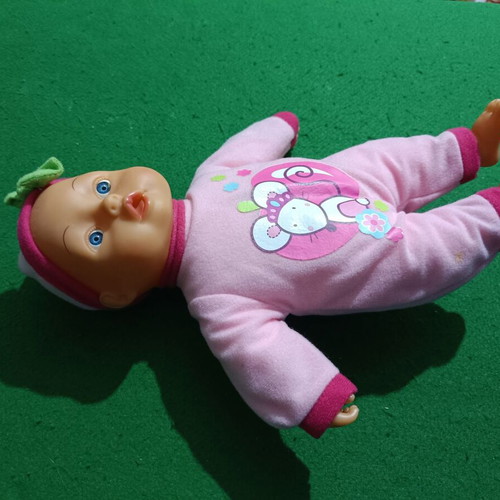 Doll with sounds and speech with soft body like new