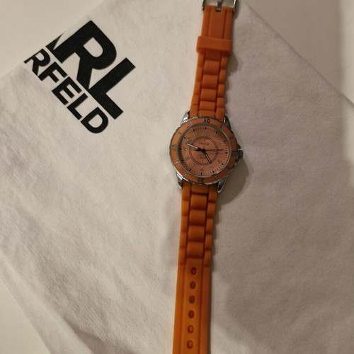 Watch with bright orange silicone strap and dial like new