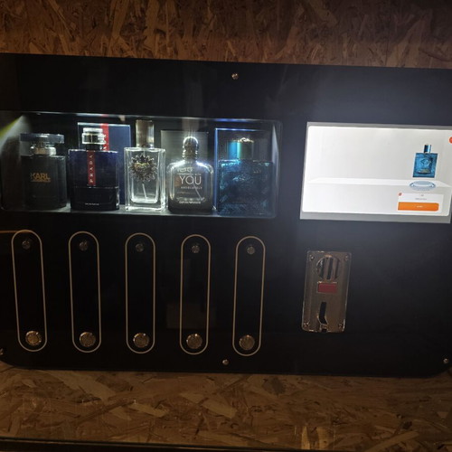 Automatic perfume vending machine with touchscreen and coin acceptor
