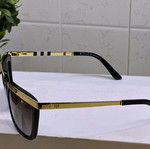 Unisex sunglasses new, black frame with gold details