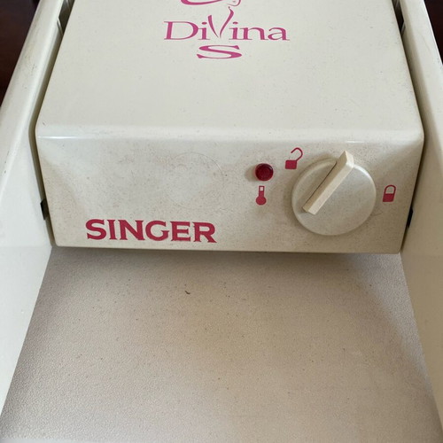Singer Divina press used, fully functional, with spare parts
