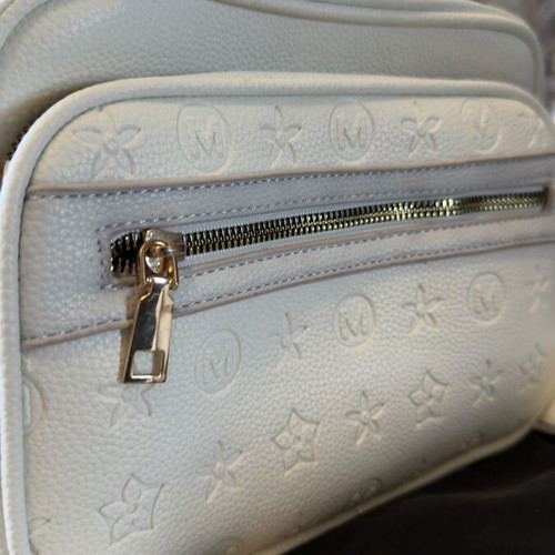 White bag with gold details and unique design, new