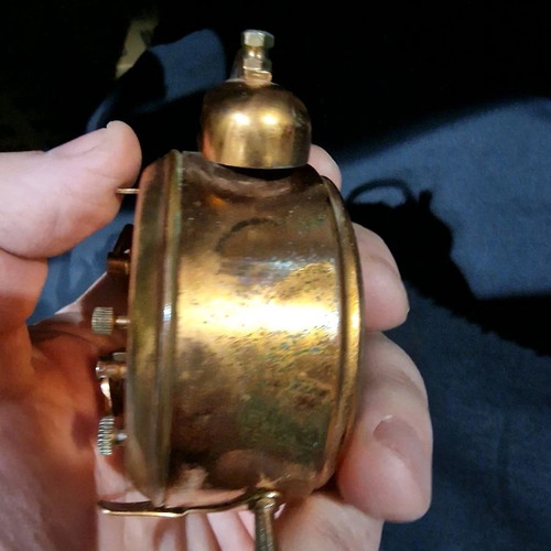 Winding table clock used for repair