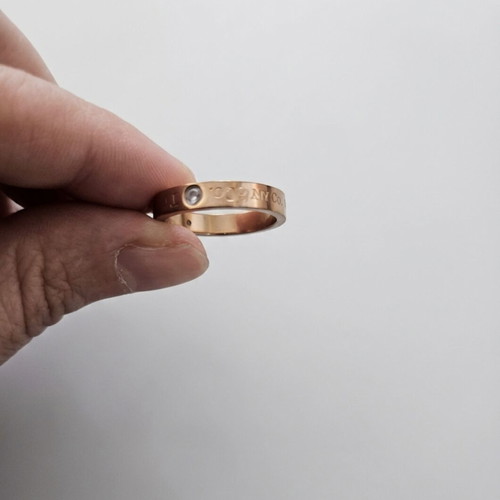 Ring used, rose gold plated with 3 zirconia stones