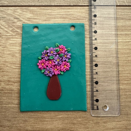 Polymer clay wall hanging with pink and purple daisies and vase like new