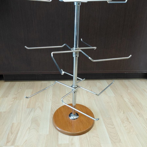 Metal three-tier countertop stand used with wooden base