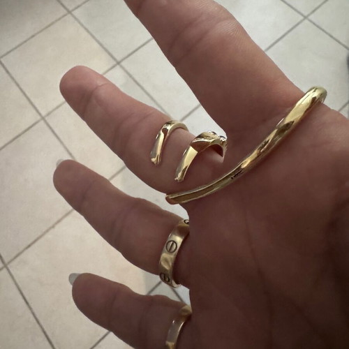 Serpenti style ring in gold stainless steel like new with black zircon stones