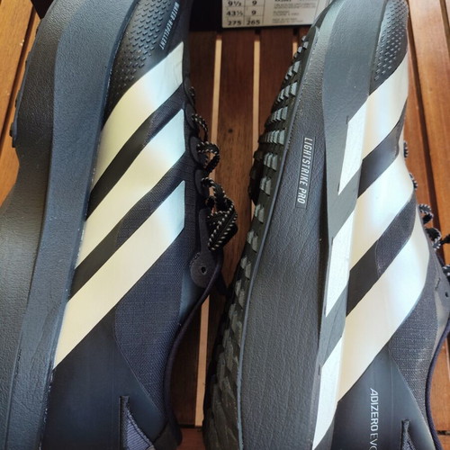 Adidas Evo SL ATR running shoes size 43.5, water-repellent, black with silver stripes