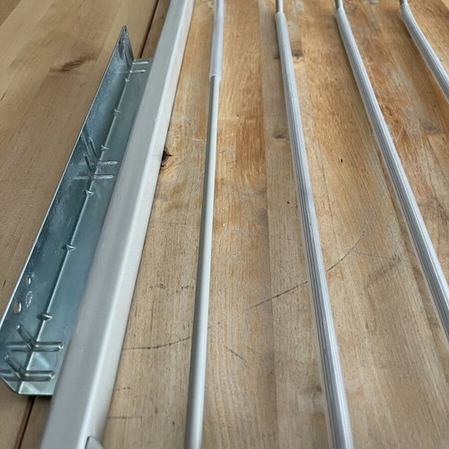 Komplement IKEA 18079 sliding metal wardrobe rack for pants organization