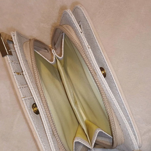 Abbey wrist wallet used, beige with gold details