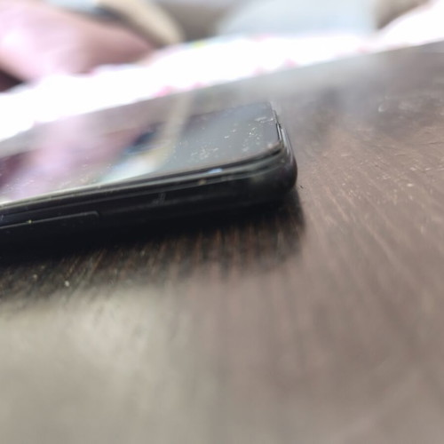 Samsung A03s smartphone with 2 cases