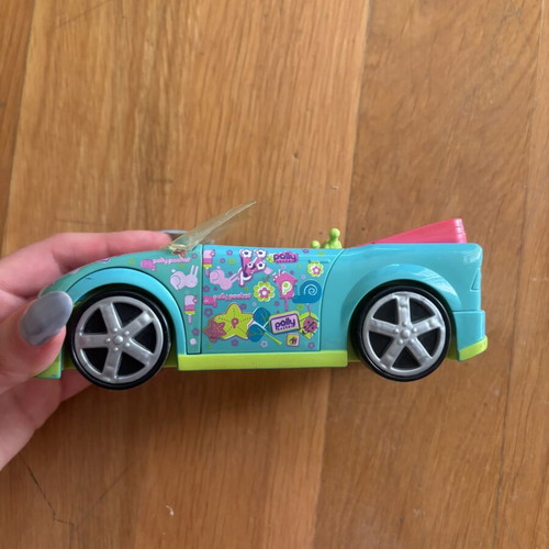 Vintage Polly Pocket set like new with car, dolls, and furniture