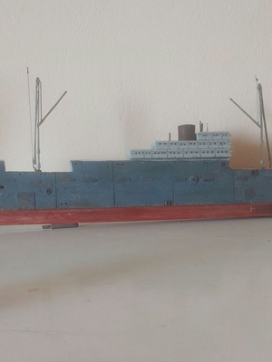 Decorative ship made from recycled materials and acrylic paint