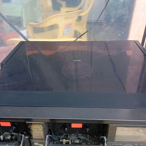 Stereo system with turntable, radio and 2 cassette players used