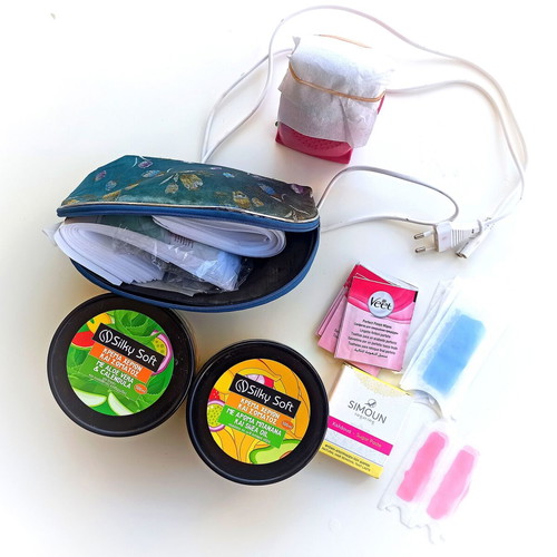 Wax hair removal machine with free hair removal product set