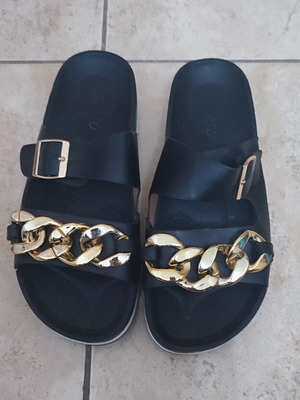 Slippers used size 39 black with gold chain detail