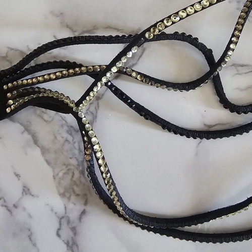 Black suede bracelet with black and beige stones