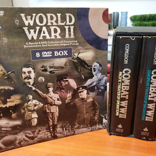 Combat WWII book set and 8 DVD collection used, English