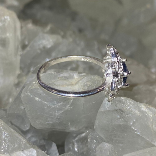 Handmade silver ring with natural blue sapphire and moissanites