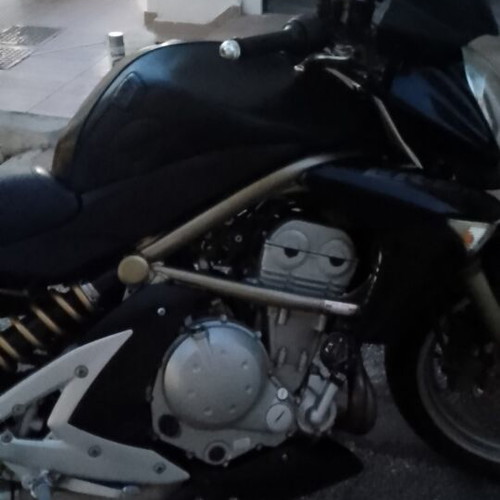 Kawasaki ER6 650cc motorcycle, 66000km, leather accessories