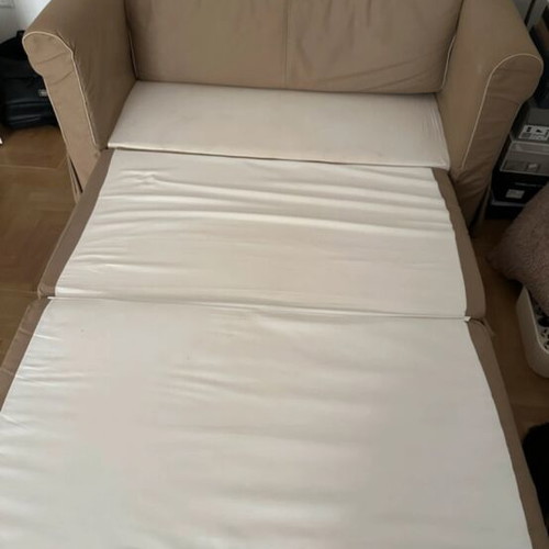 Two-Seater Sofa Bed beige with removable fabric cover, like new