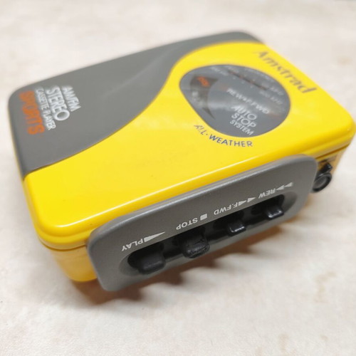Amstrad All Weather Sports Vintage Walkman used, yellow cassette radio