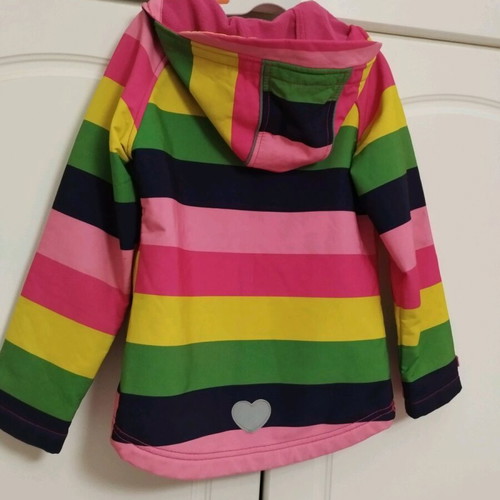 Children's waterproof jacket like new, multicolored for ages 6-7