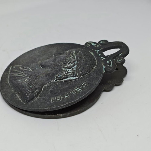 Vintage bronze Delphi paper clip 1947 used