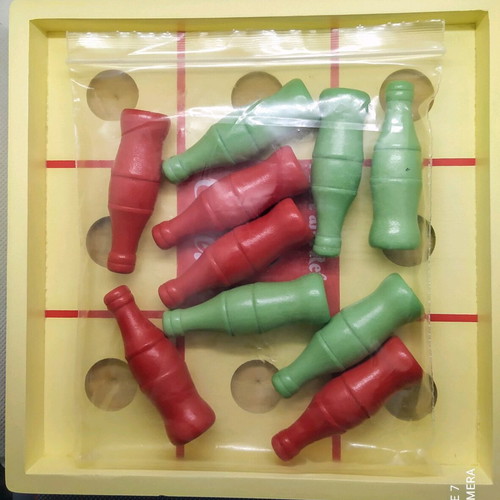 Wooden tabletop Tic Tac Toe game by Coca-Cola