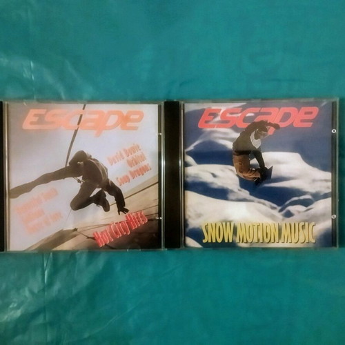 Escape Hot City Hits and Snow Motion Music CDs like new