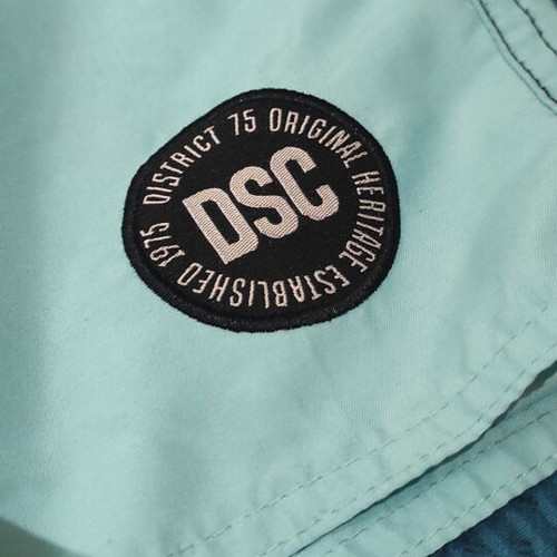 District swim shorts used, black and turquoise, size M, defect