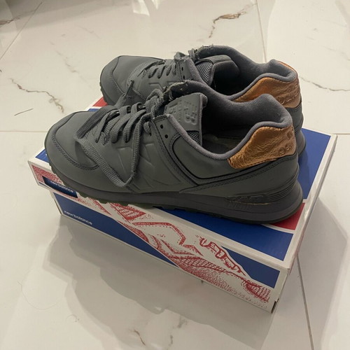 New Balance athletic shoes used, gray, size 40