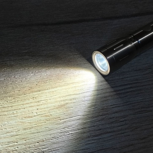 Mini stainless steel LED flashlight like new, AAA battery