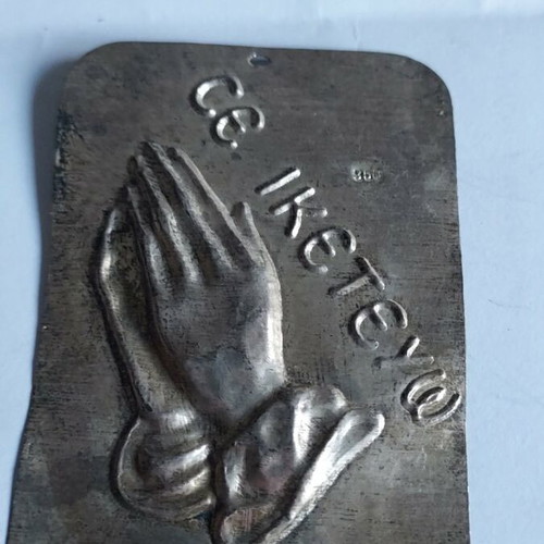 Religious silver tama with praying hands and inscription like new