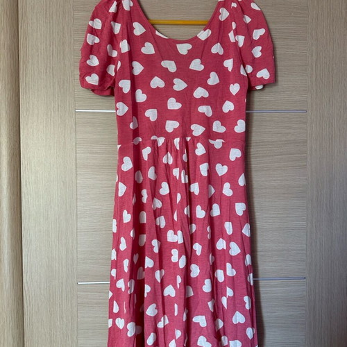 Red dress with playful white heart pattern, short sleeves, used