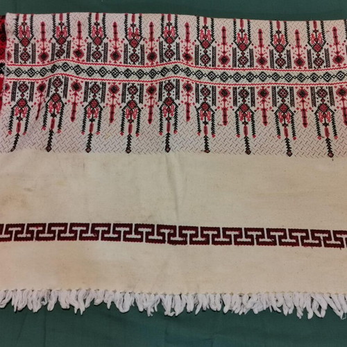 Woven bed sheet used with stain and wear from 1930 era