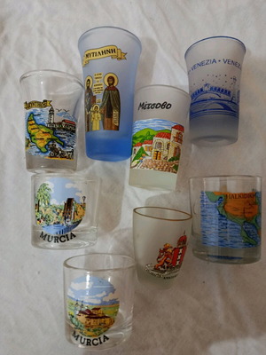 Souvenir shot glasses like new from Greece and Spain