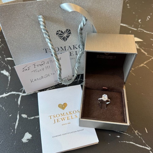Oval solitaire ring white zircon 14K white gold like new