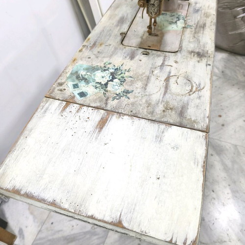 Singer sewing machine decorated with decoupage and aging, used