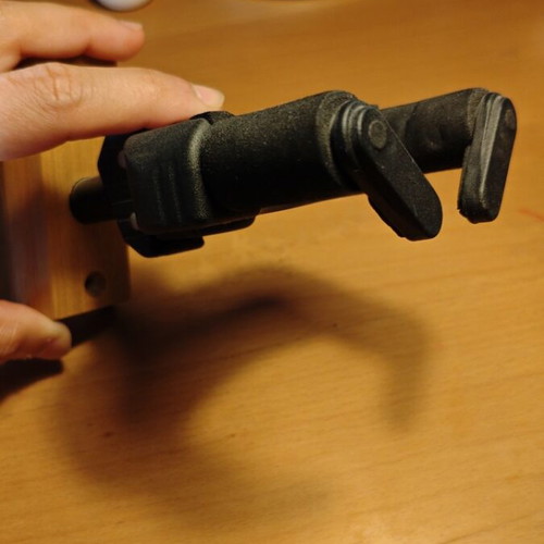 Hercules wall mount guitar and bass stand used