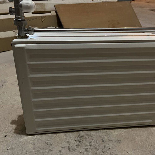 Used two-column radiator 60x40 cm with new switch and metal pipe