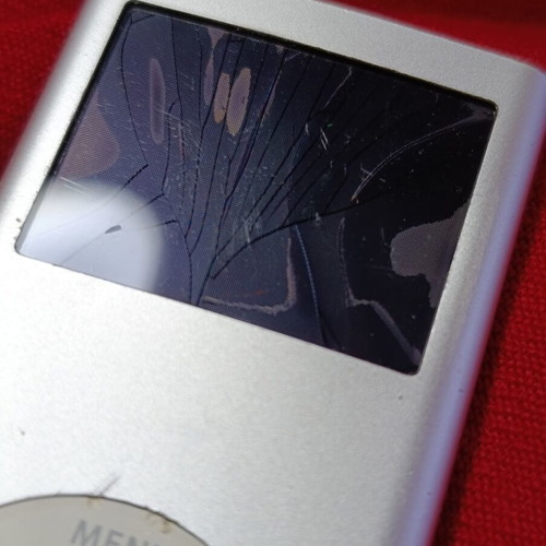 Apple MP3 digital music player with cracked screen