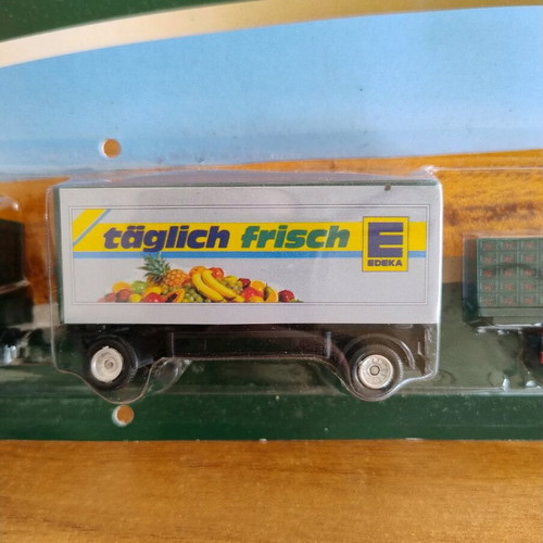 Man truck with double trailer and forklift by Brinkhoff new