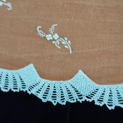Handmade embroidery with crochet lace used
