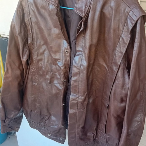 Leather jacket brown size large with metal buttons used