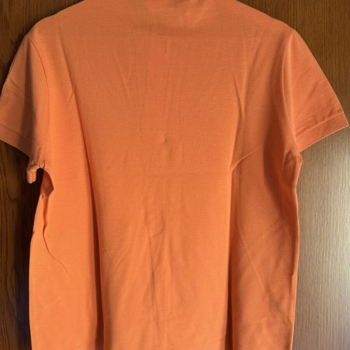 Lacoste polo shirt like new, size 3, peach color