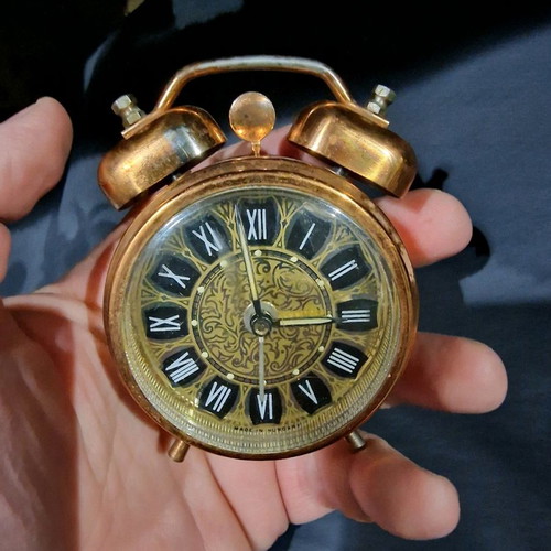 Winding table clock used for repair