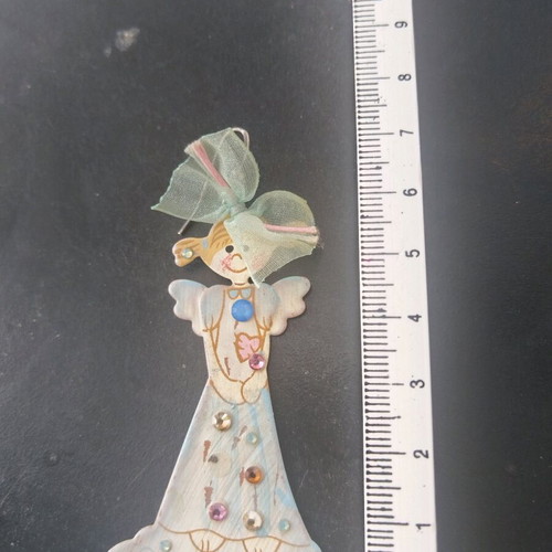 Single long earring used, about 8 cm