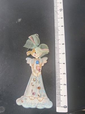 Single long earring used, about 8 cm